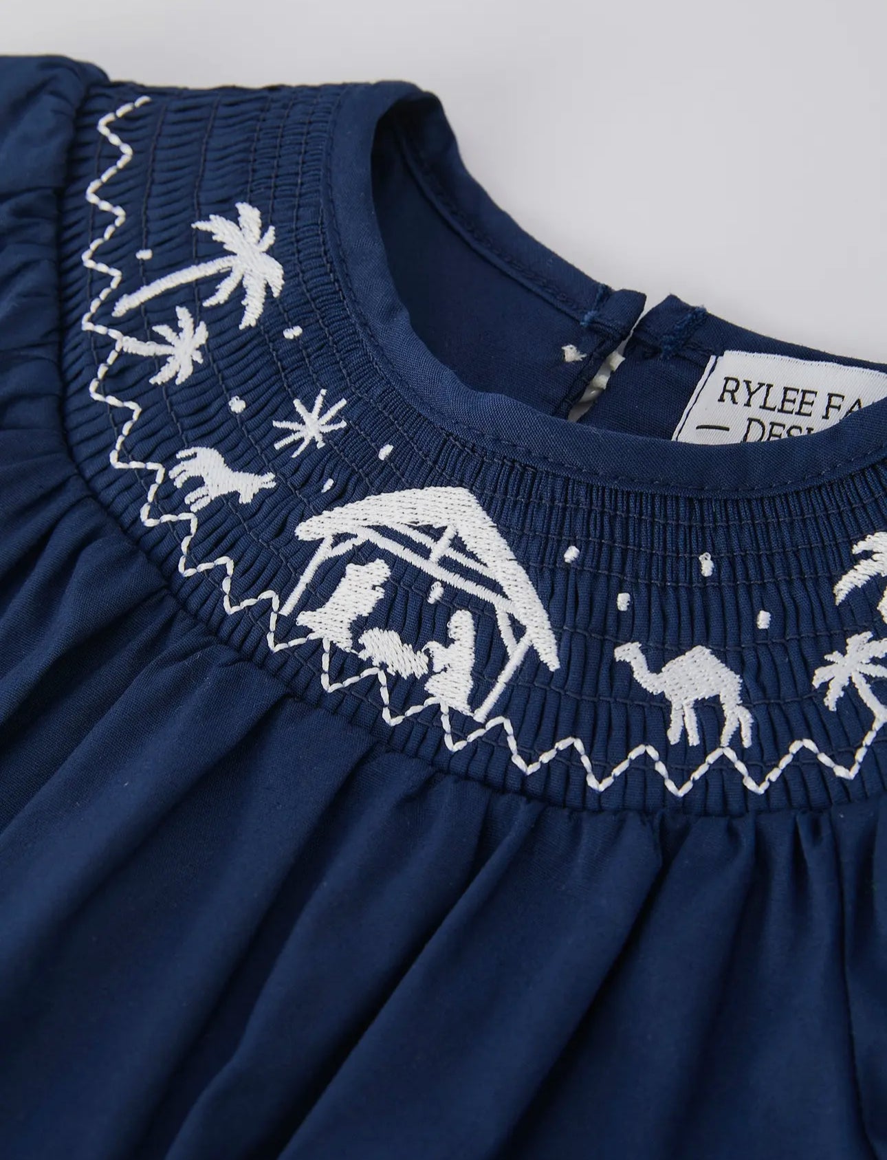 Navy Blue Nativity Smocking
Embroidered Baby Girls Christmas
Romper